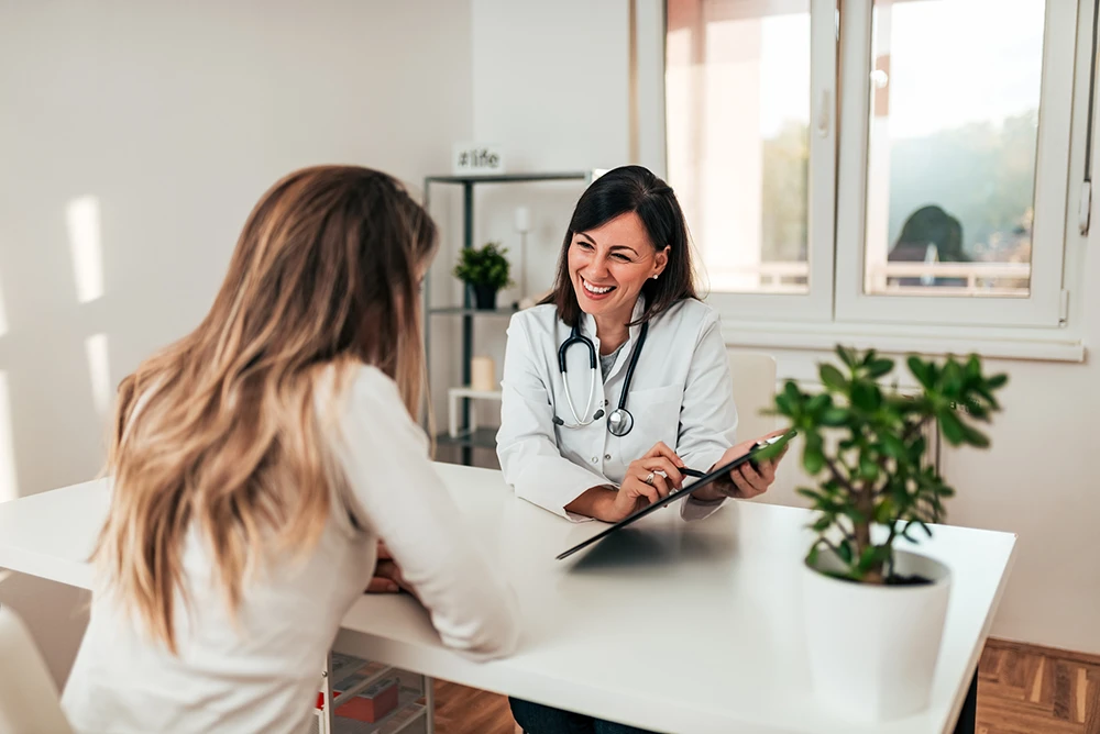 Female Patient Consulting With A Rhinoplasty Facial Plastic Surgeon