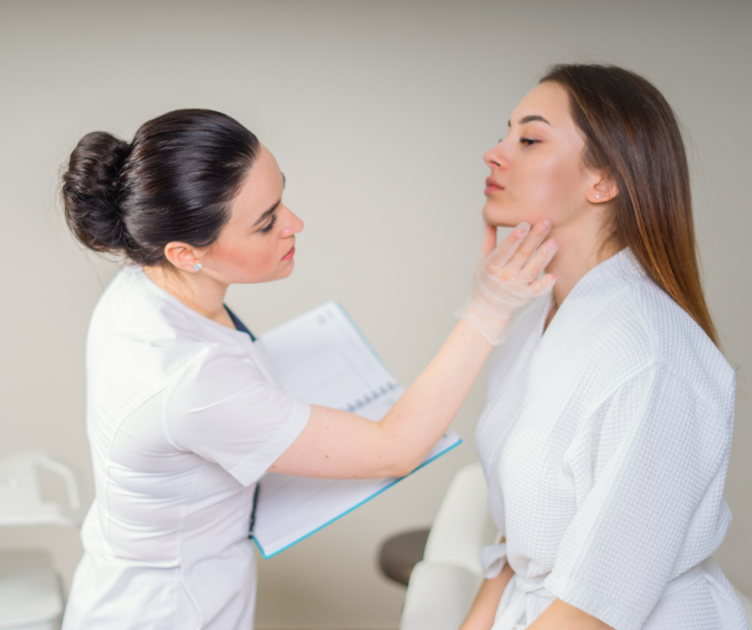 Medical Professional Evaluating Female Patient for Ultherapy